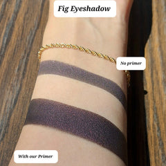 Deep eggplant purple shimmer eyeshadow in compact with vegan and cruelty-free label visible