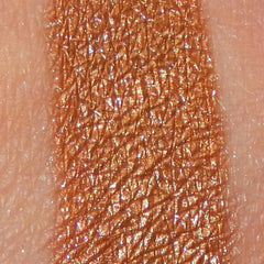 Side view of Mineral Makeup Desert Trio showing three earthy-toned eye shadows in compact palette with satin finish.