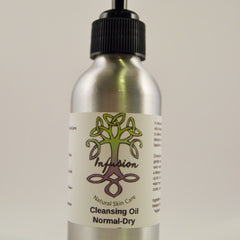 Cleansing Oil bottle with silver metal, black cap, and white label with "Infusion" text