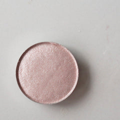 Side view of MOONSTRUCK shimmer eyeshadow duo in taupe and mauve pink, showing mineral makeup texture in 10g jar
