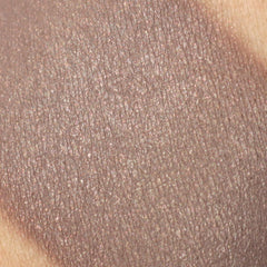 Side view of Terra vegan mineral eyeshadow pot showing deep brown shade with subtle shimmer particles.