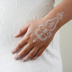 Usage example of Gentle White Henna Tattoos  Boho Festival Skin Art  Safe Temporary Designs Note